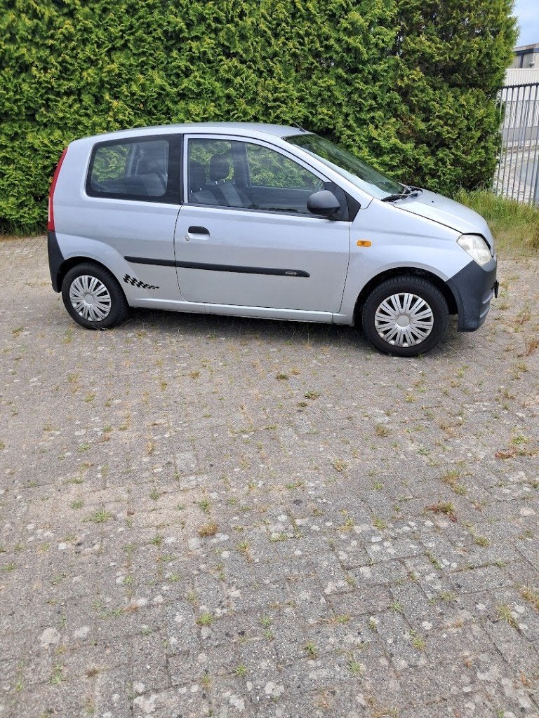 Daihatsu Cuore 1.0 Osaka 3D 2006 Grijs, Auto's, Voorwielaandrijving, 600 kg, 18 €/maand, Cuore