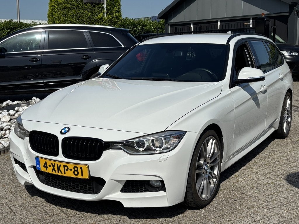 BMW 3 Serie Touring 320i Exe M-Pakket 2014 Wit Trekhaak, Auto's, BMW, 15 km/l, Gebruikt, Euro 6, 4 cilinders