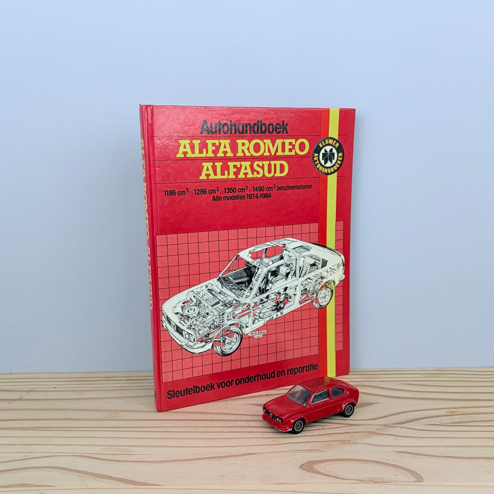 Autohandboek + modelauto Alfa Romeo Alfasud (1974-1984), Ophalen of Verzenden, Gelezen, Alfa Romeo