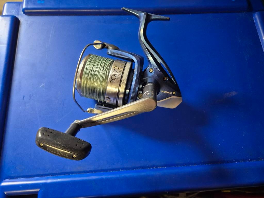 Shimano Aerlex XSA 7000 +gevlochten lijn, Ophalen of Verzenden, Molen