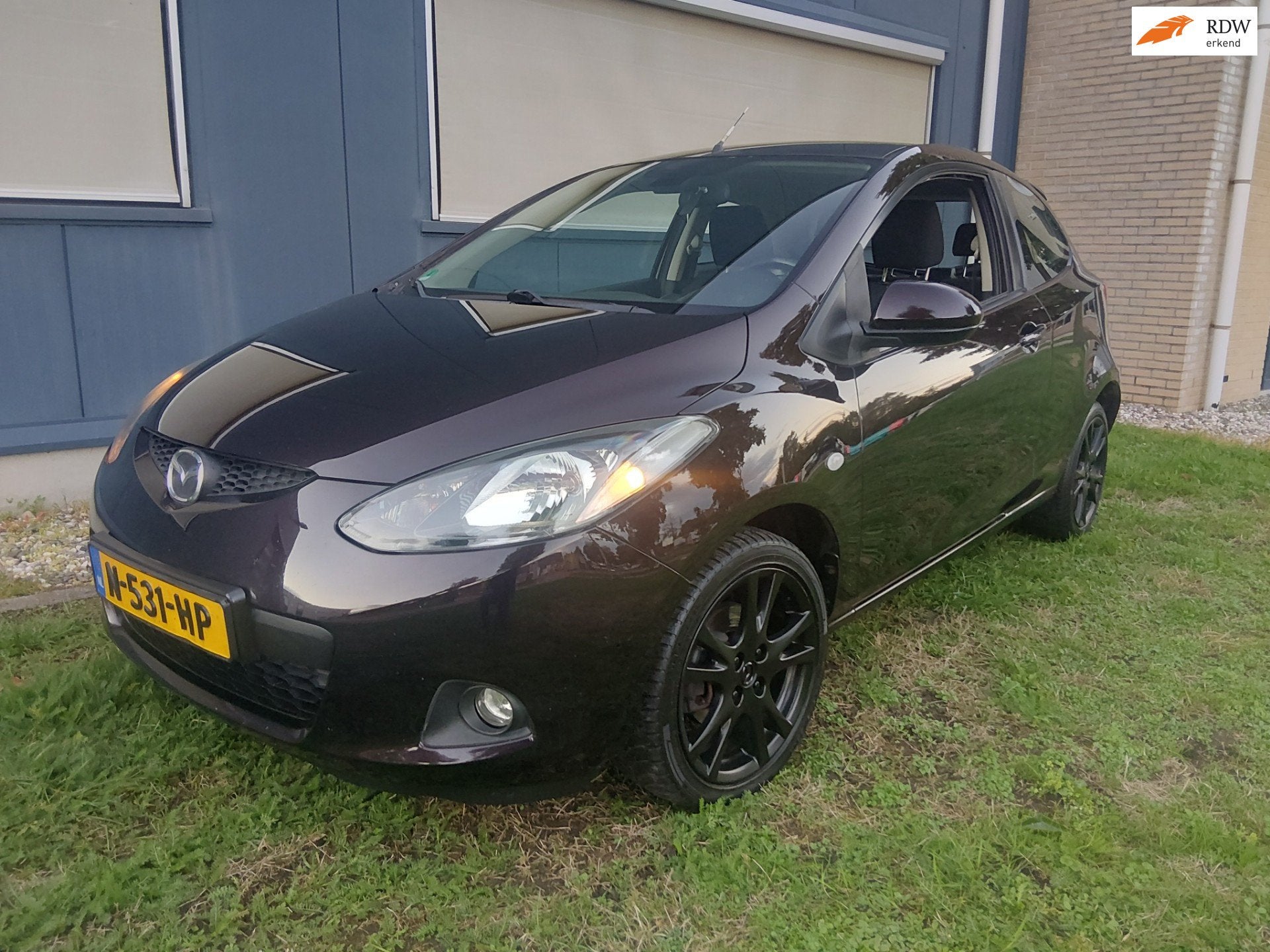 Mazda 2 1.3hp S-VT Touring 2009 Airco PDC, Auto's, Voorwielaandrijving, Gebruikt, 31 €/maand, 4 cilinders