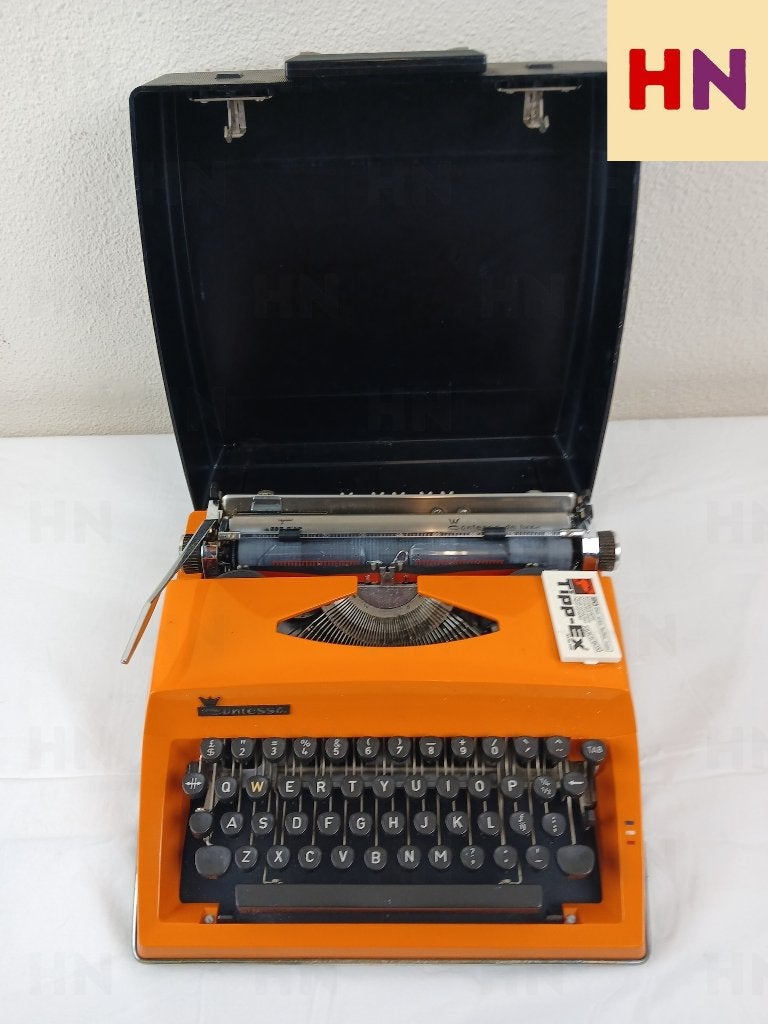Vintage Oranje Typemachine Adler Contessa De Luxe (Jaren 70), Diversen, Typemachines, Ophalen of Verzenden, Adler-Werk vorm. Heinrich Kleyer AG