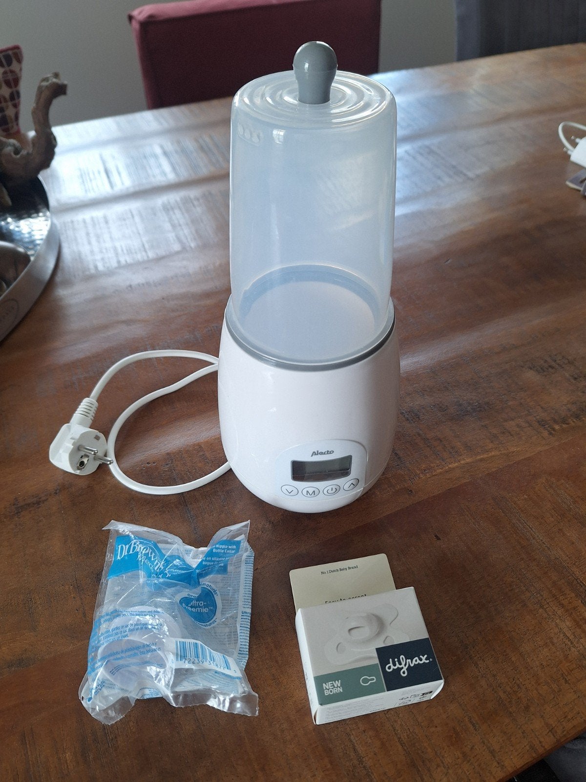 Alecto flessenwarmer met Difrax fopspenen, Ophalen