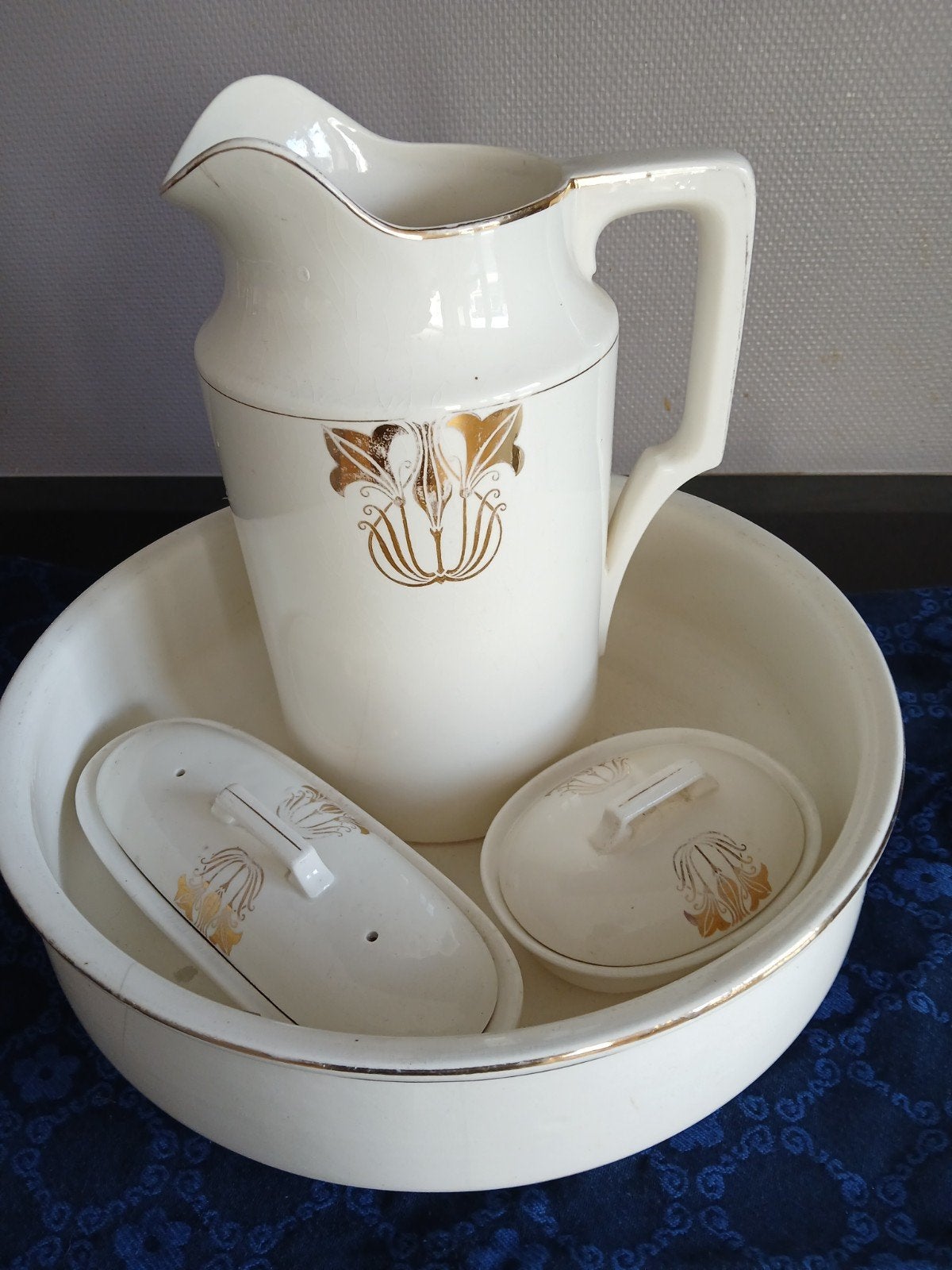Lampetstel met goudkleurige decoratie, Ophalen
