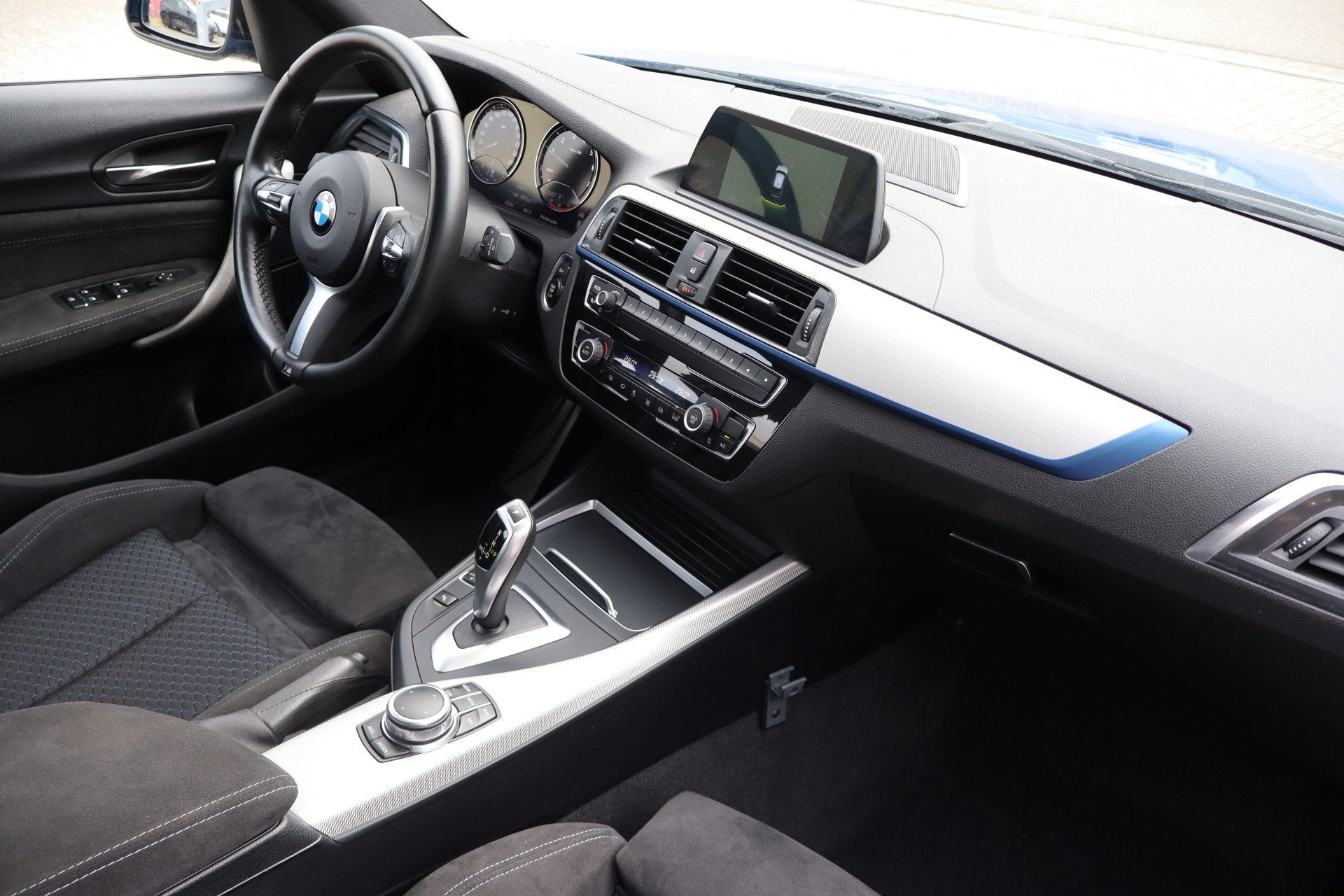 BMW 1-serie 118i M Sport Executive Automaat/Nederlandse auto, Auto's, 12 maanden, Gebruikt, Blauw, Bedrijf