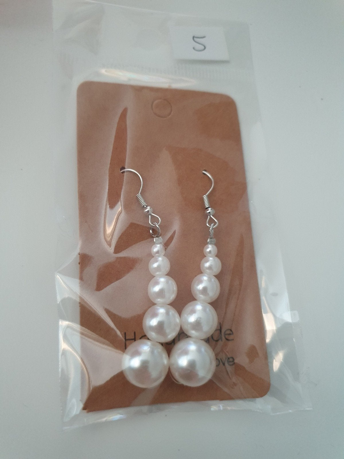 Elegante oorbellen - opbrengst voor Run for Kika, Ophalen of Verzenden, Nieuw, Overige materialen
