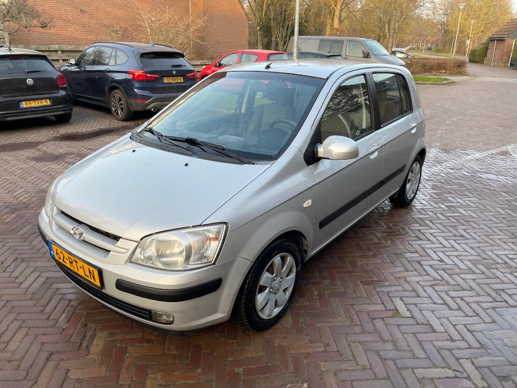 Hyundai Getz 1.3i Dynamic 5DRS 2005 Grijs, Auto's, Voorwielaandrijving, 40 €/maand, 4 cilinders, Origineel Nederlands