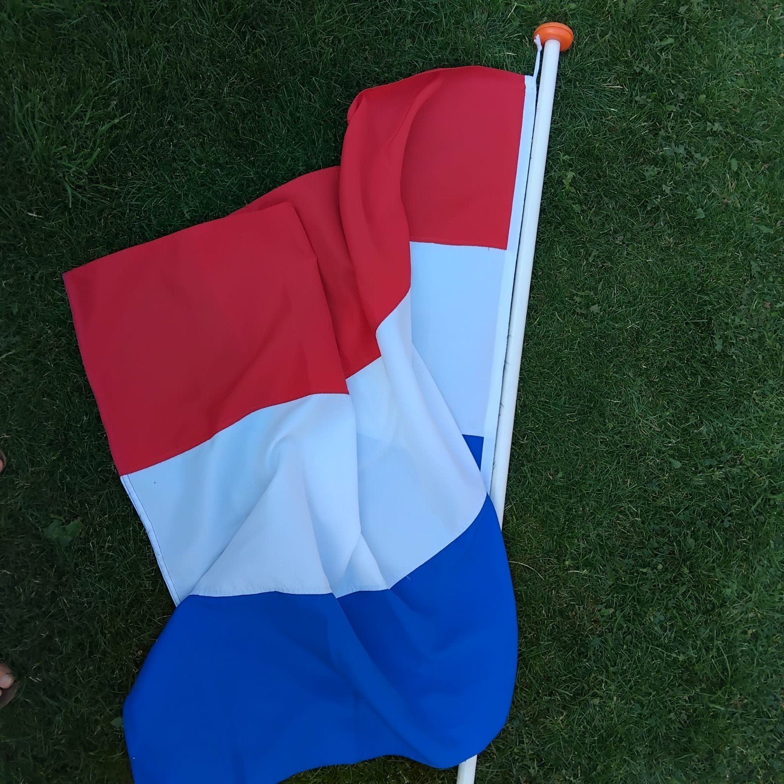 Nederlandse vlag, Ophalen, Zo goed als nieuw