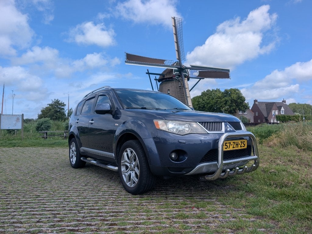 Mitsubishi Outlander 2.4 Intense+ 7zits,Leder,Carplay,Camera, Auto's, Mitsubishi, Lichtsensor, Outlander, Zwart, 4 cilinders
