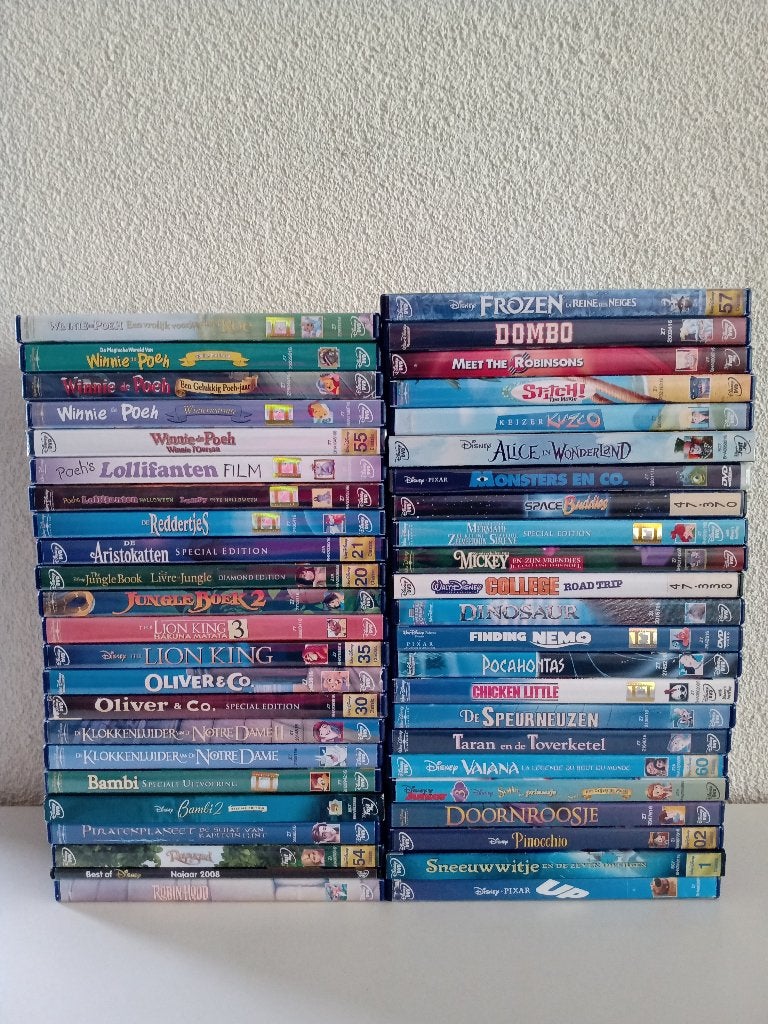 46 DVD's met WALT DISNEY Films, Gebruikt, Alle leeftijden, Overige genres, Ophalen of Verzenden
