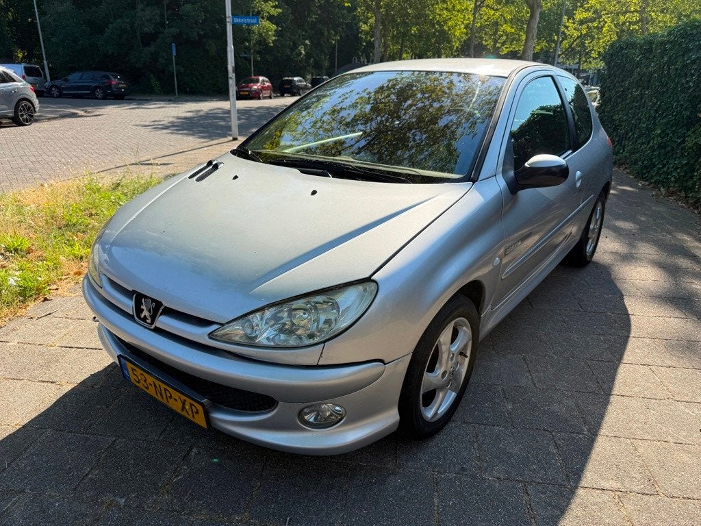 Peugeot 206 1.4-16V Quiksilver Airco, Auto's, Peugeot, Voorwielaandrijving, 31 €/maand, 4 cilinders, Origineel Nederlands