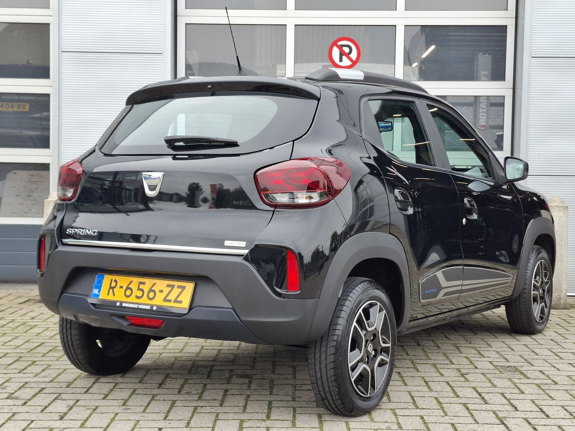 Dacia Spring Comfort 27 kWh | SoH 93.3% | Lichtmetalen Velge, Stof, Gebruikt, Zwart, 230 km