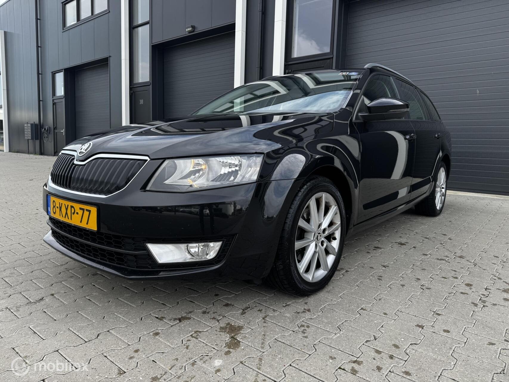 Skoda Octavia Combi 1.4 TSI Greentech Ambition Businessline, Auto's, Voorwielaandrijving, Gebruikt, 4 cilinders, Zwart