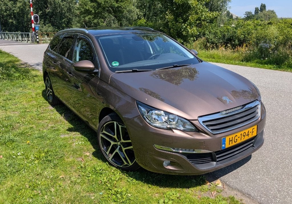 Peugeot 308 SW 1.2 130pk, Motor revisie bij 123k! PANO TREKH, Auto's, Peugeot, Stof, 1199 cc, Bluetooth, Origineel Nederlands