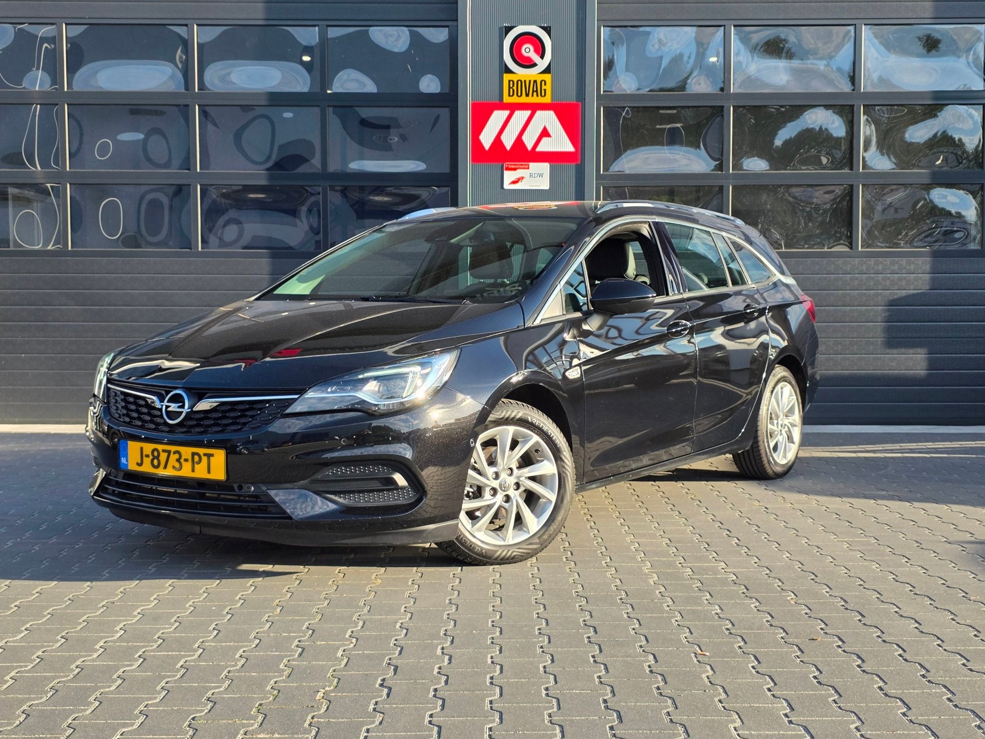 Opel Astra Sports Tourer 1.2 Elegance | TREKHAAK | NAVI | CA, Auto's, Voorwielaandrijving, Dealer onderhouden, Stof, Gebruikt