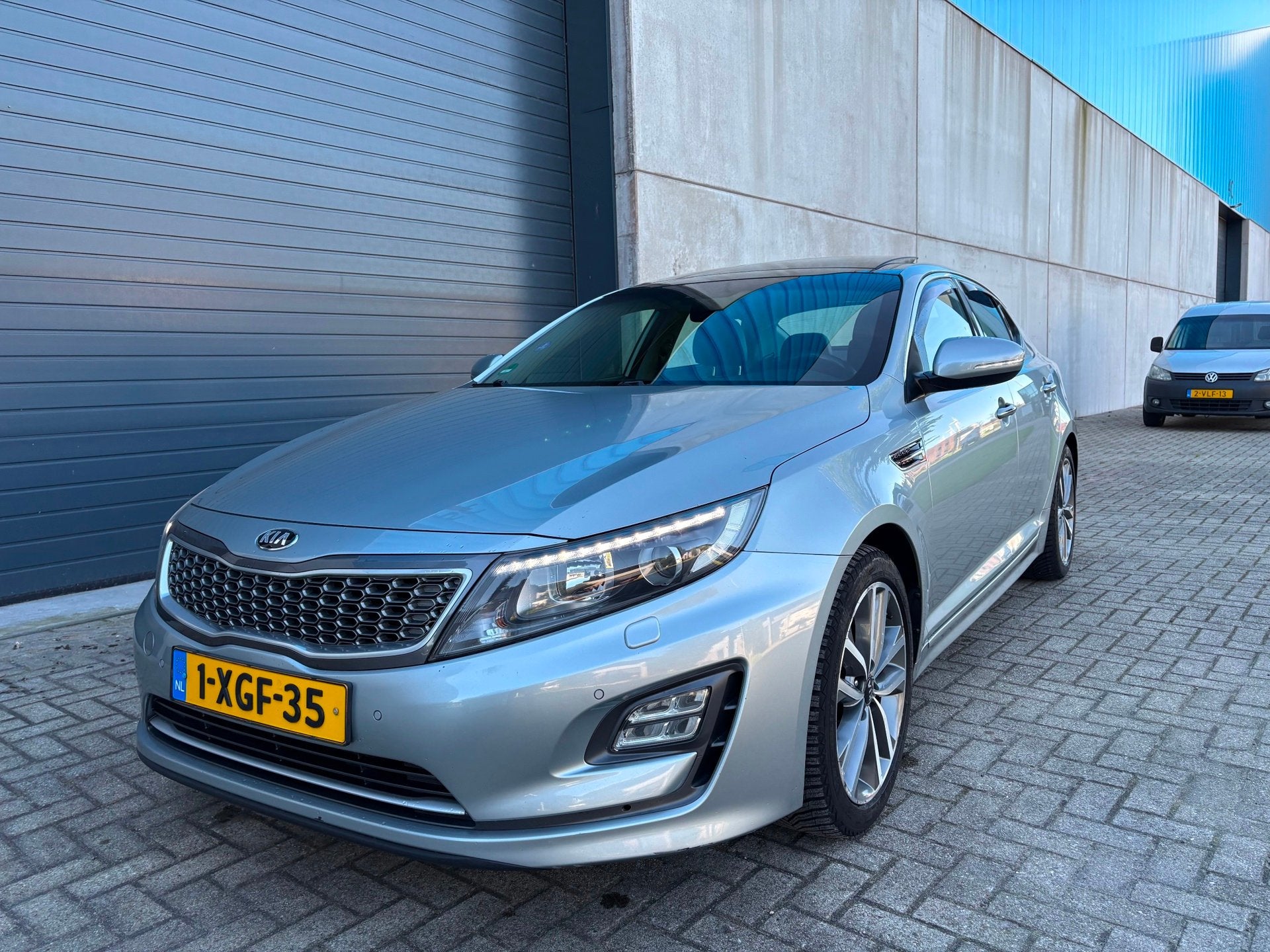 Kia Optima 2.0 CVVT Hybrid Executive Line AUT PANO LEDER, Auto's, Euro 5, Gebruikt, Zwart, 4 cilinders