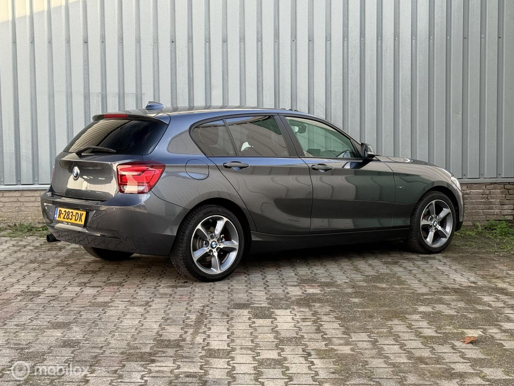 BMW 1-serie 116i Sport High Executive | Schuifdak | Climate, 4 cilinders, 650 kg, Automatische klimaatregeling, 5 stoelen