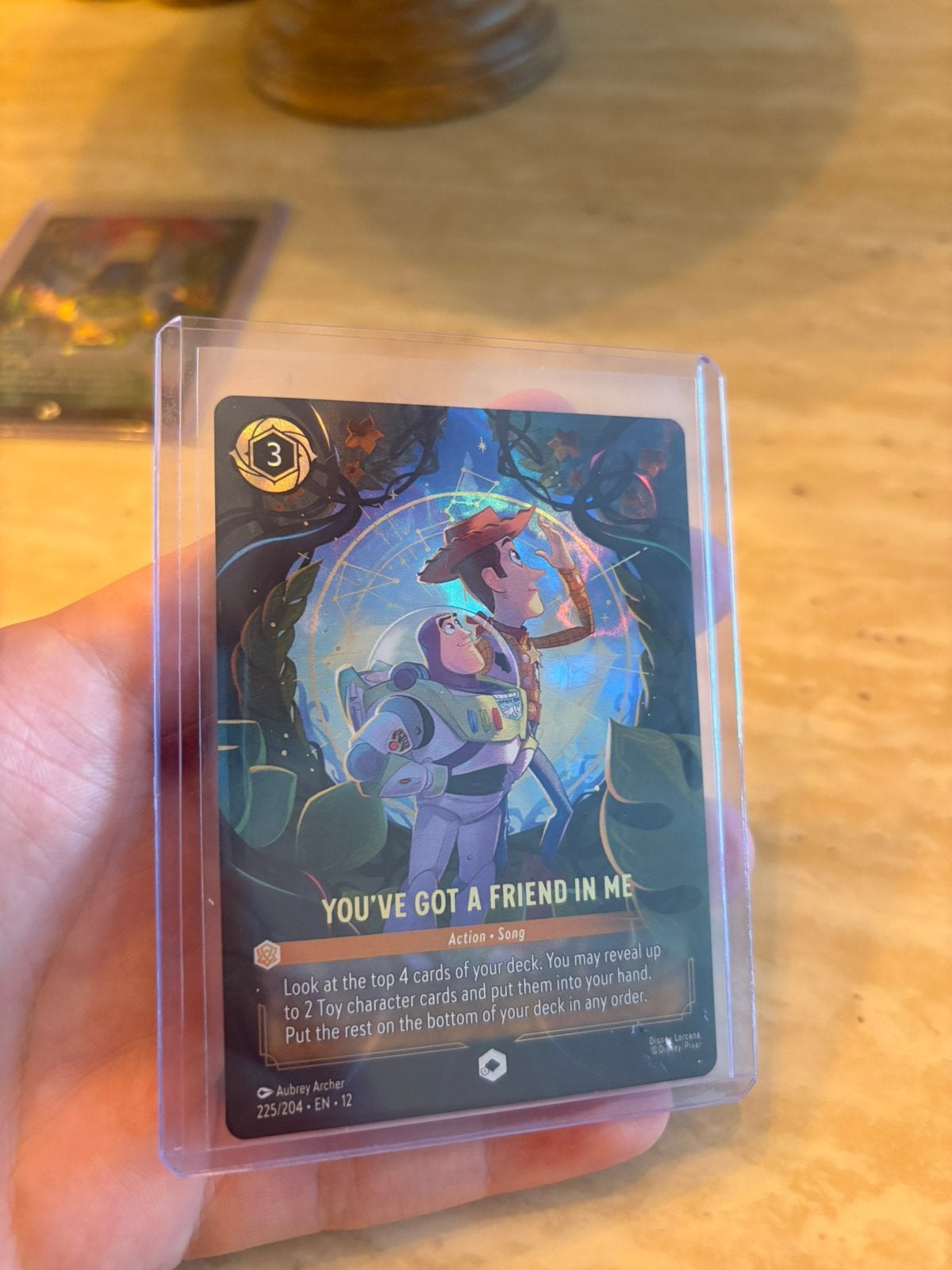 Disney lorcana Wilds Unknown You've got a friend in me 225, Hobby en Vrije tijd, Verzamelkaartspellen | Overige, Ophalen, Zo goed als nieuw