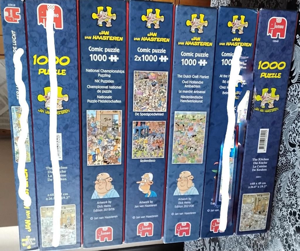4 dozen met puzzels van Jan v. Haasteren zie foto's, Ophalen