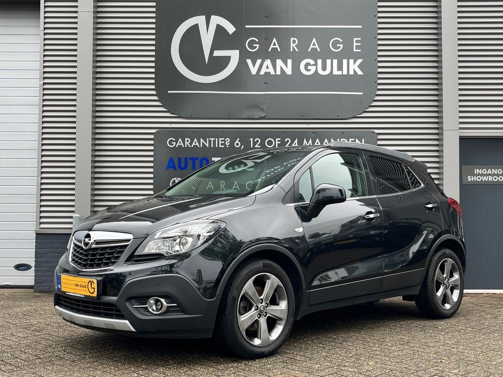 Opel Mokka 1.4 T 140PK Navi,Clima,Cruise,Isofix,Bluetooth,El, Auto's, Opel, Bi-Xenon koplampen, Gebruikt, 4 cilinders, Leder en Stof