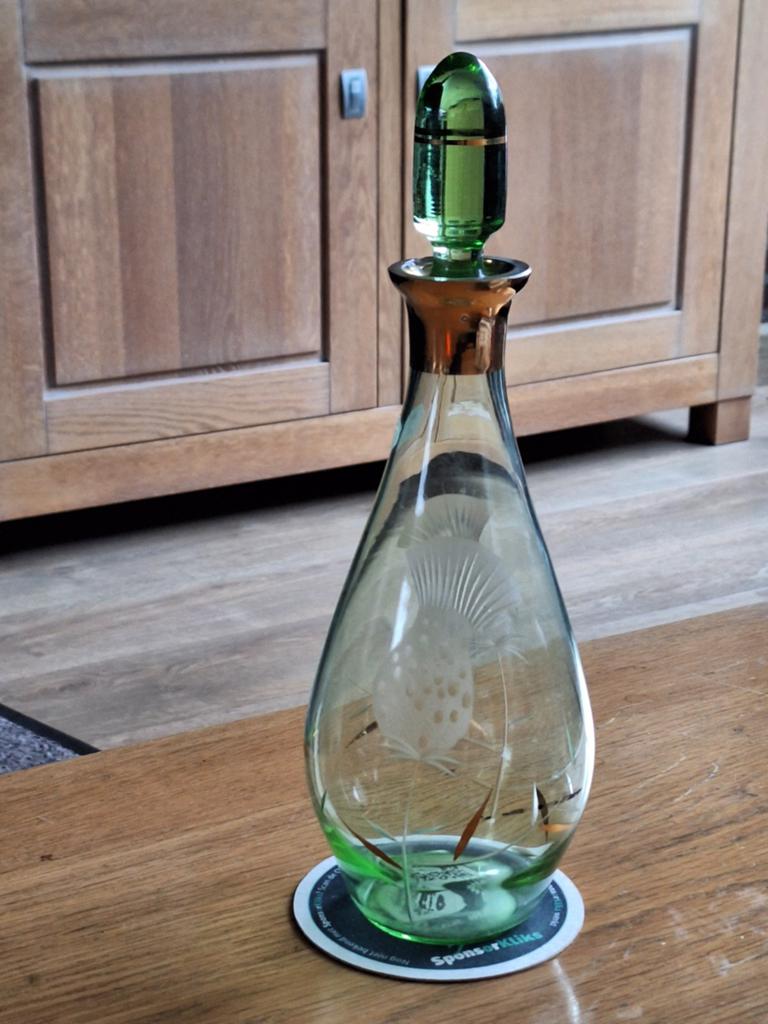 Te koop decoratie groene fles met motief, Ophalen of Verzenden