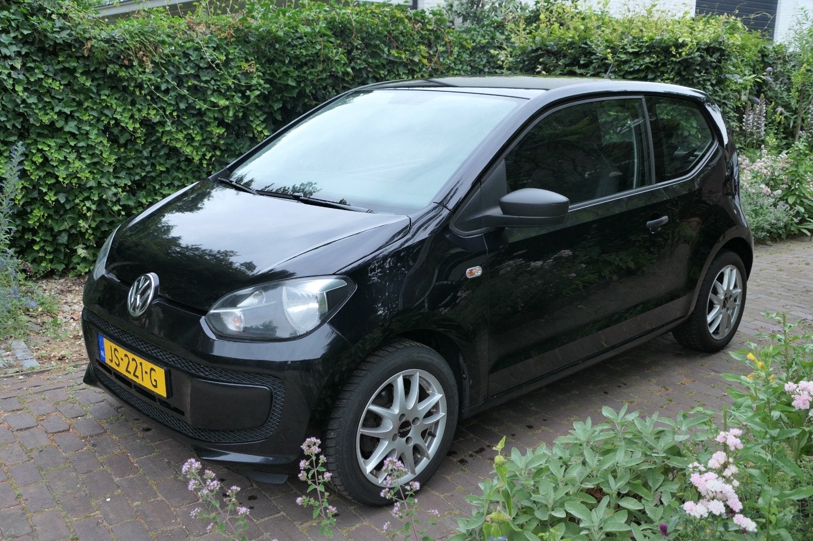 Volkswagen up! 1.0 44KW 2012 Zwart, Voorwielaandrijving, 4 stoelen, Zwart, Handgeschakeld