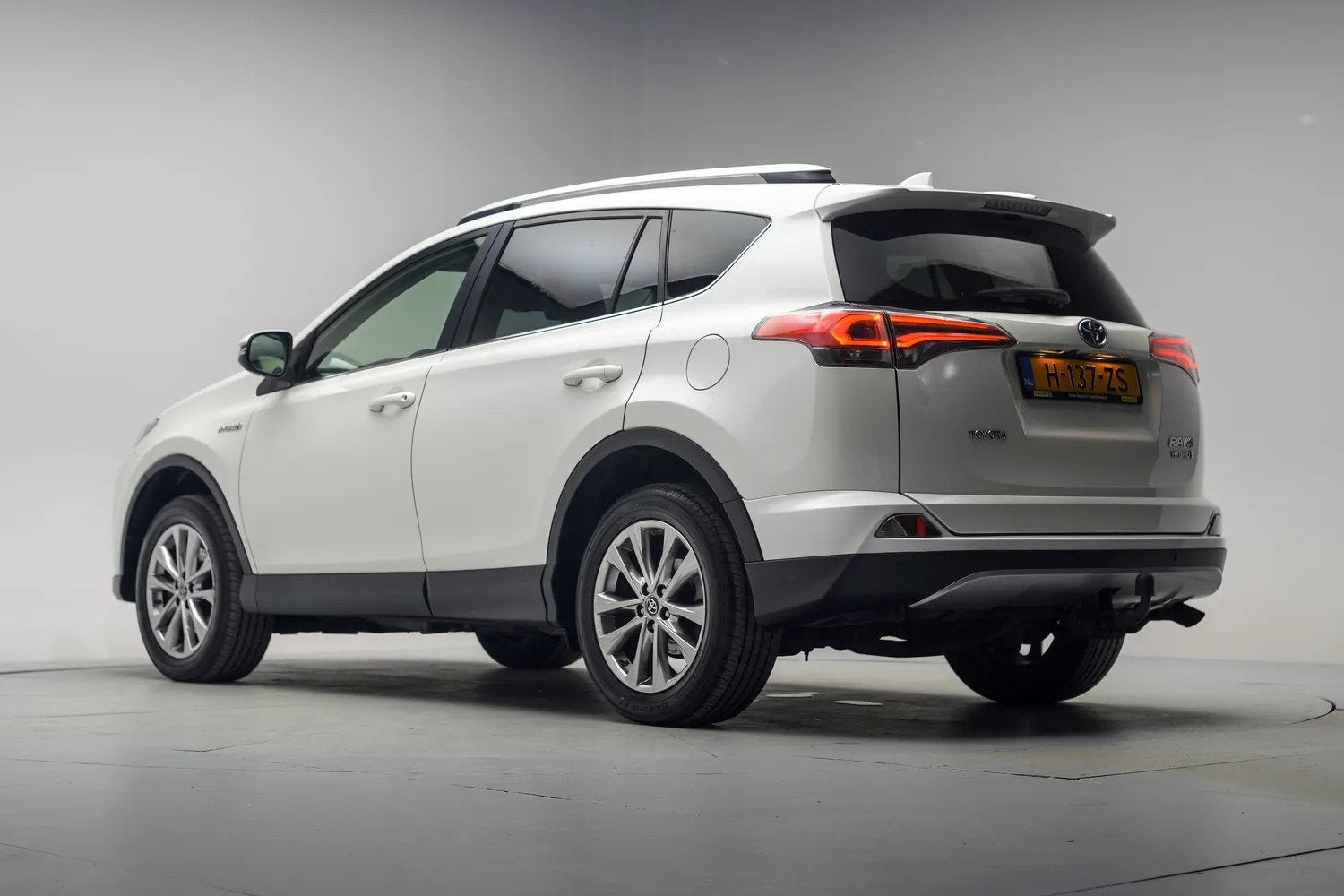 Toyota RAV4 2.5 Hybrid AWD Executive [ Schuifdak Leder 360-C, Auto's, Automaat, Gebruikt, 1650 kg, Wit