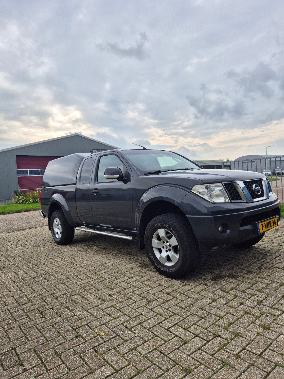 Nissan Navara 2.5 DCI King-cab 4WD DPF 2010, Auto's, 4 cilinders, Origineel Nederlands, Vierwielaandrijving, 1930 kg