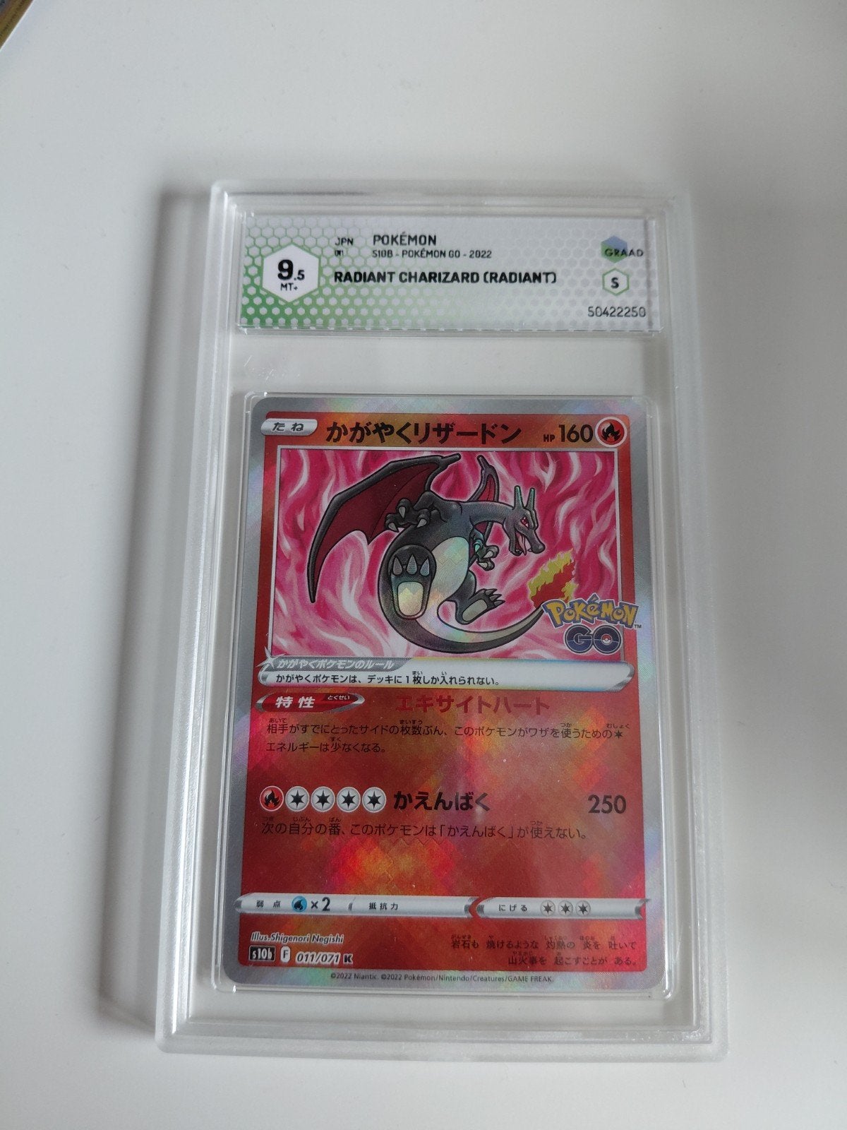 Radiant charizard grade 9.5 mint, Ophalen of Verzenden, Zo goed als nieuw