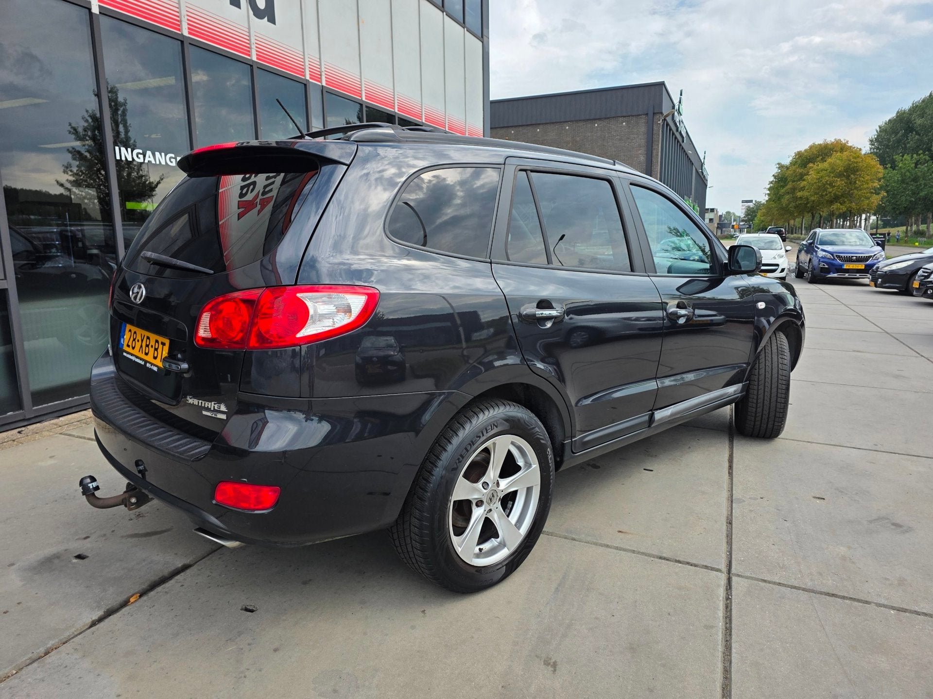 Hyundai Santa Fe 2.7i V6 Style - 7 Persoons - Leer - Clima -, Auto's, Voorwielaandrijving, Santa Fe, Gebruikt, Zwart
