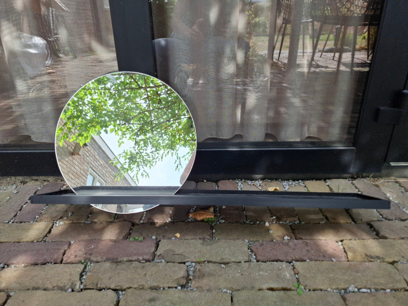 Zwarte wandplank met ronde spiegel, Rond, Ophalen of Verzenden, Zo goed als nieuw, 75 tot 100 cm