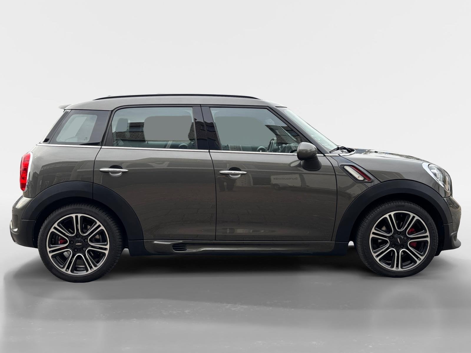 MINI Countryman 1.6 John Cooper Works ALL4 Chili | Pano-dak, 1380 kg, Gebruikt, Zwart, Leder en Stof