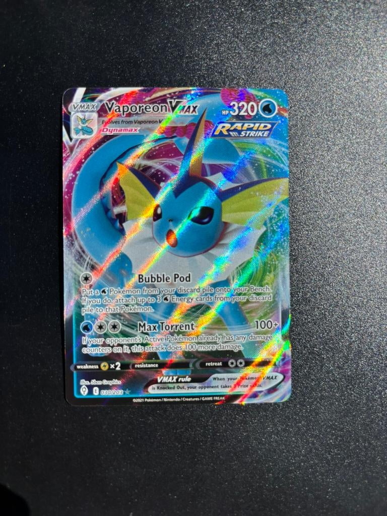 Vaporeon VMAX (EVS 030), Ophalen of Verzenden, Zo goed als nieuw