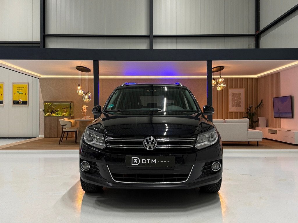 Volkswagen Tiguan 1.4 TSI Sport&Style Aut. | Navigatie | Car, Auto's, 15 km/l, 4 cilinders, 150 pk, Zwart