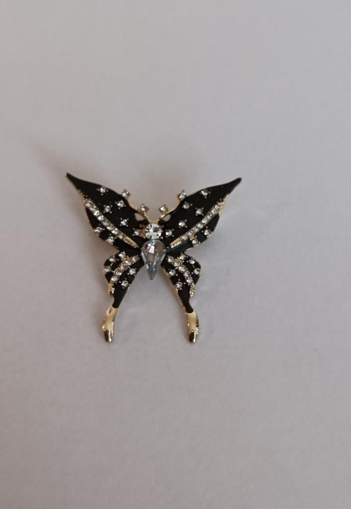 Vlinder broche, Sieraden, Tassen en Uiterlijk, Broches, Nieuw, Overige materialen, Overige kleuren, 4 tot 7 cm, Met strass, Ophalen of Verzenden