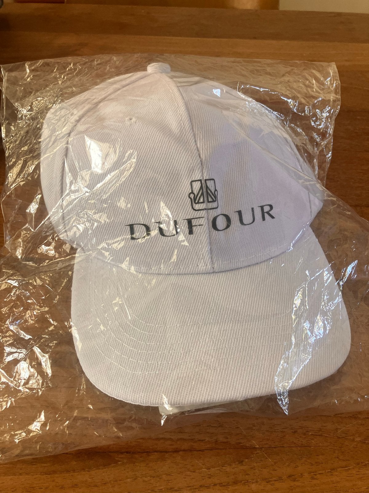 Dufour Zeilboot Cap , nieuw -  Sneldrogend, Watersport en Boten, Ophalen of Verzenden, Nieuw, Dame of Heer, Overige typen