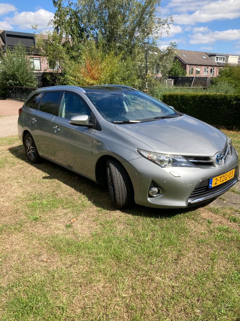 Toyota Auris TS. 1.8 Hybrid Nette staat, Zonnedak,Trekhaak!, Auto's, Toyota, 136 pk, Auris, 1320 kg, Volledig hybride