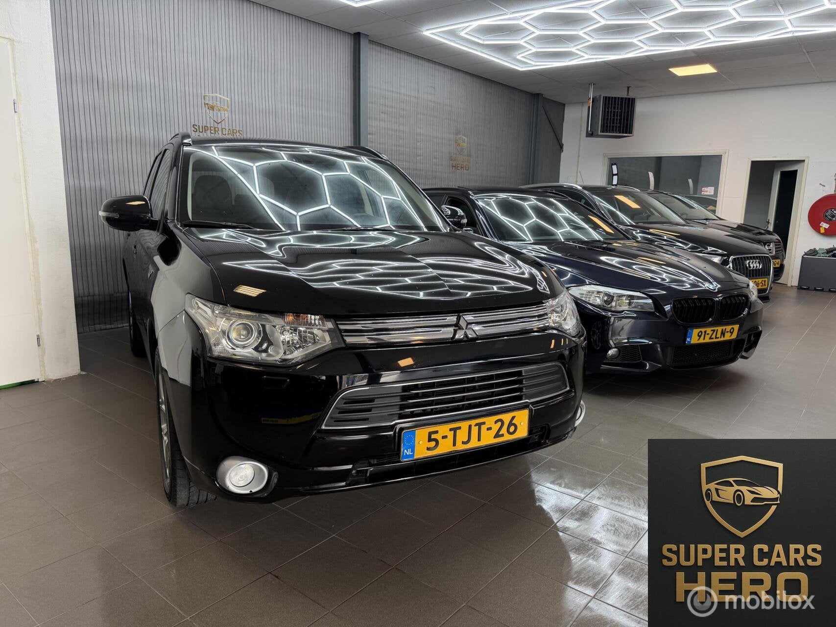 Mitsubishi Outlander 2.0 PHEV Instyle, Auto's, Zwart, 4 cilinders, Zwart, Bedrijf