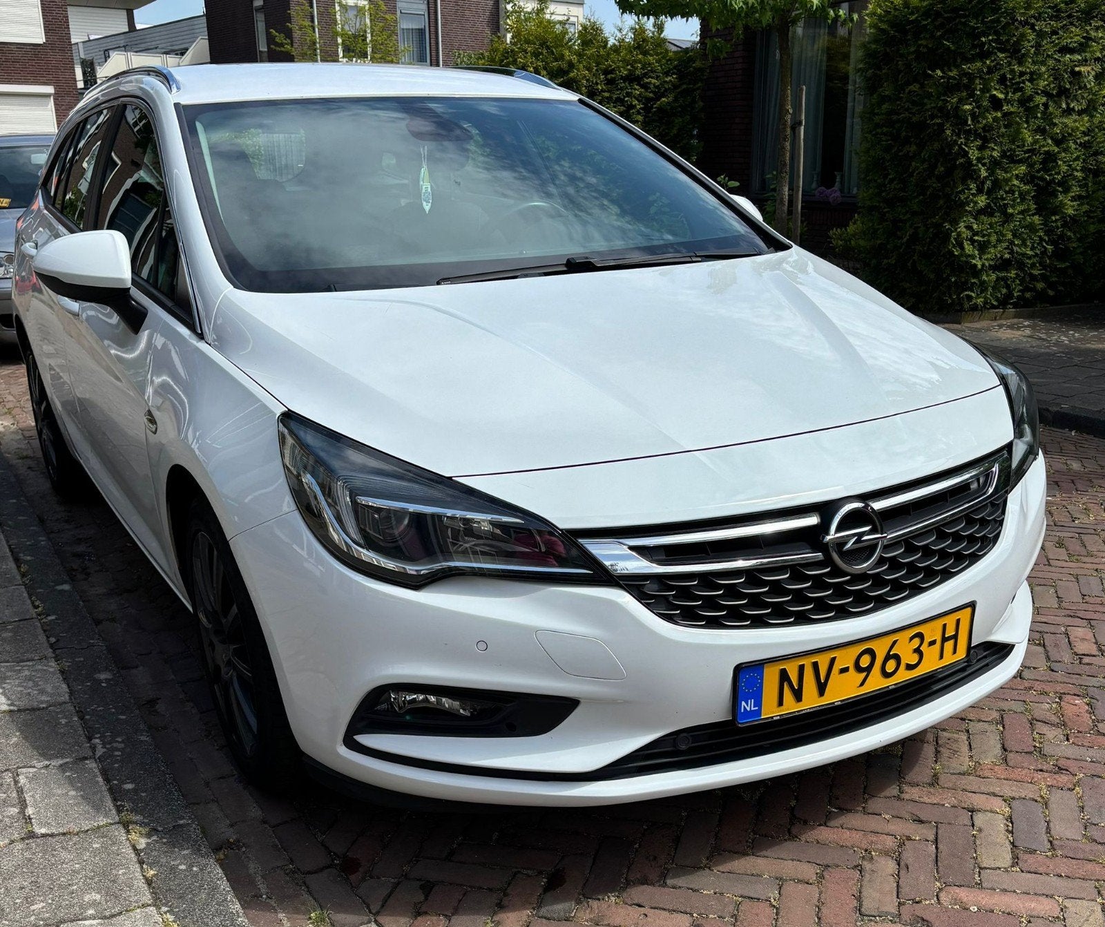 Opel Astra 1.0 Turbo 77KW Sports Tourer 2017 Wit, Auto's, Opel, Voorwielaandrijving, Stof, Zwart, 1178 kg