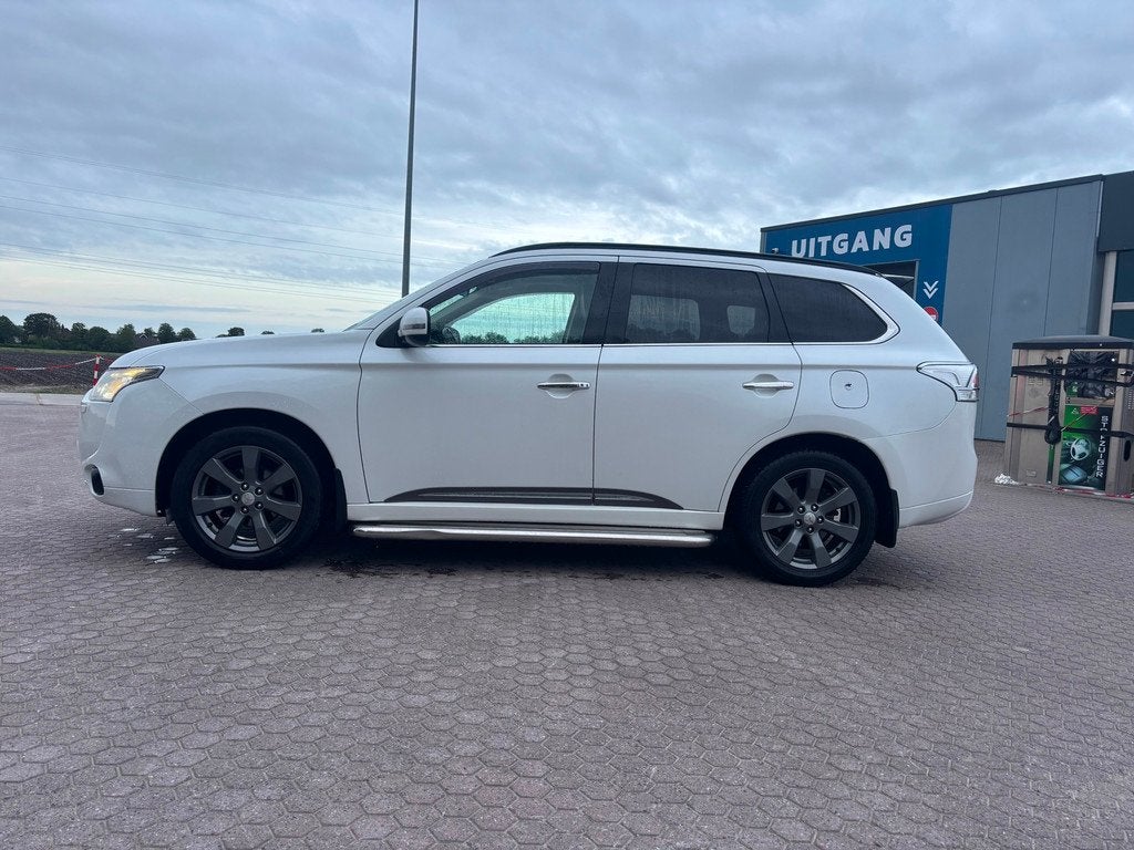 Mitsubishi Outlander 2.0 Instyle 7 PERS AUT, Auto's, Zwart, 4 cilinders, 150 pk, 7 stoelen