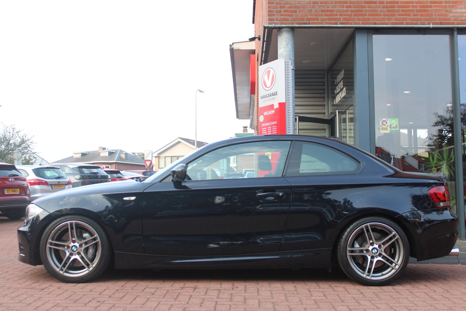 BMW 1-Serie 135i Coupé Handgeschakeld *High Executive* | Sc, Auto's, BMW, 1-Serie, Euro 5, Gebruikt, Zwart