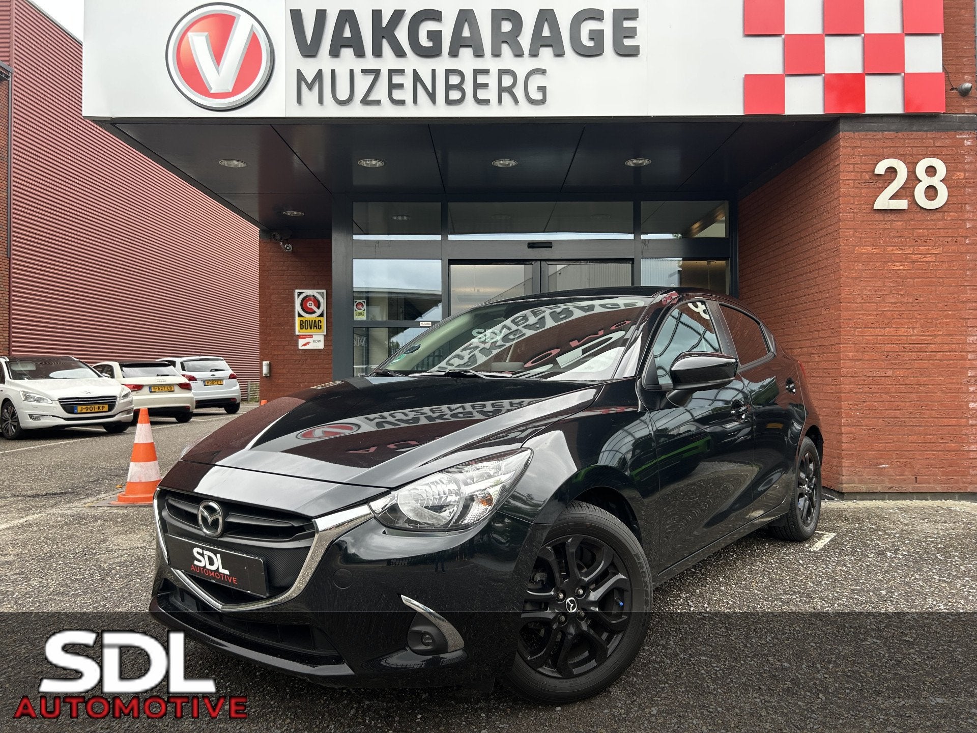 Mazda 2 1.5 Skyactiv-G TS+ // DEALER ONDERHOUDEN! // NAVI //, Auto's, Voorwielaandrijving, Gebruikt, Zwart, 4 cilinders