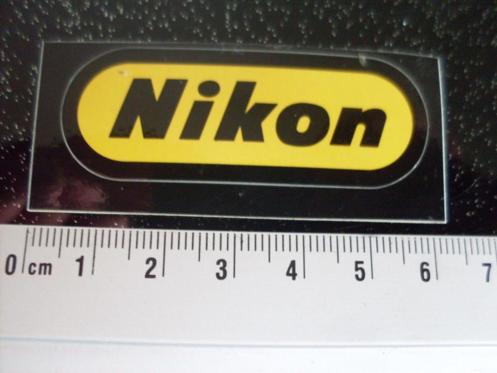 sticker Nikon logo klein camera fotocamera fototoestel, Verzamelen, Stickers, Ophalen of Verzenden, Zo goed als nieuw, Merk