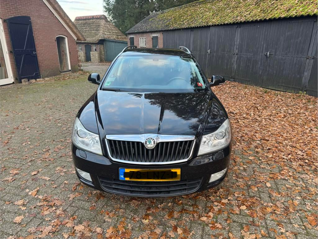 Skoda Octavia 1.8 TSI 118KW Combi 2010 Zwart, Voorwielaandrijving, Stof, Zwart, 4 cilinders