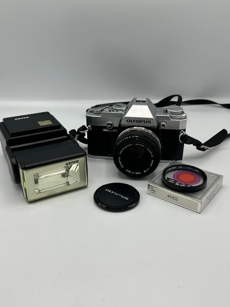 Olympus OM-30 Spiegelreflexcamera met Bauer flitser, Ophalen of Verzenden, Gebruikt, Spiegelreflex, Olympus
