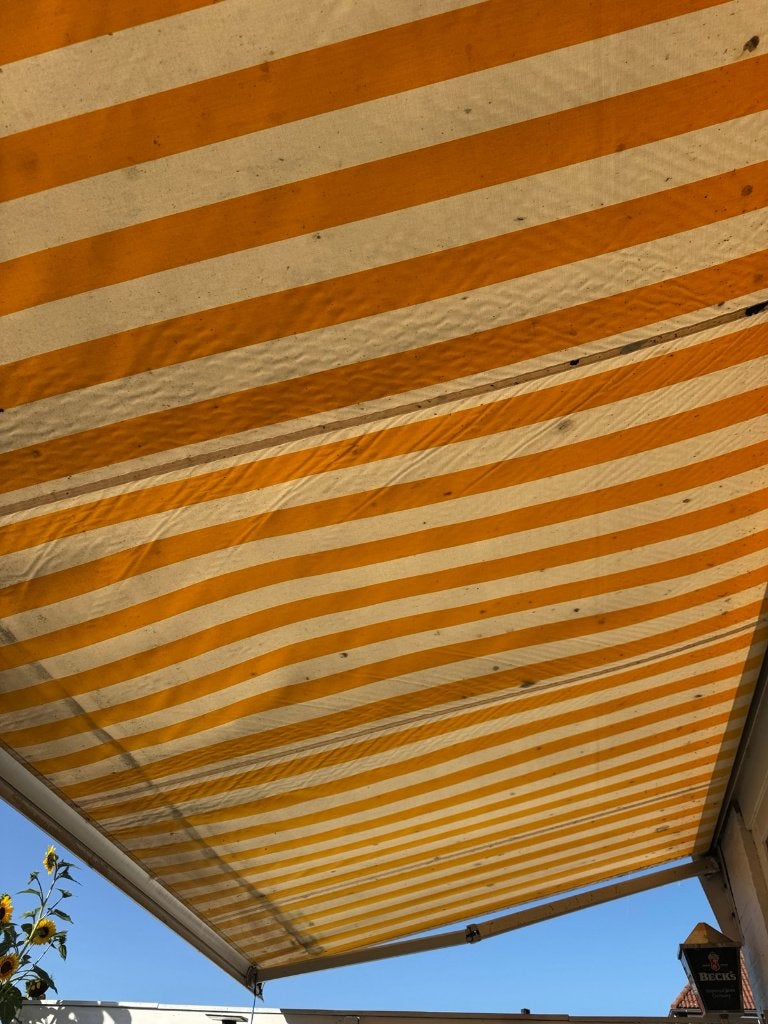 Knikarmscherm 5.20m breed, doek in redelijke staat, Ophalen, Gebruikt, 450 cm of meer, 150 tot 300 cm