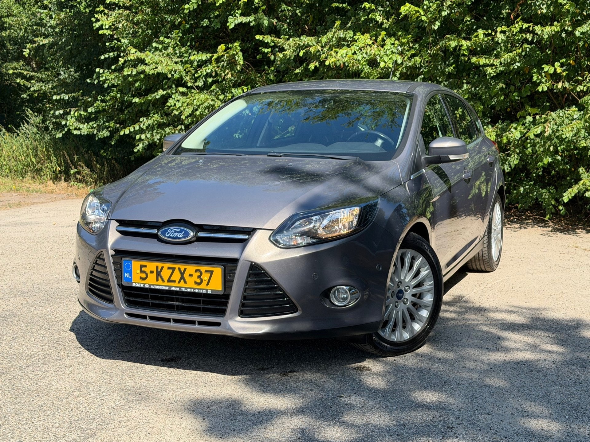 Ford Focus 1.0 EcoBoost Titanium | Cruise control + Navi Nu, Auto's, Euro 5, 101 pk, Gebruikt, Bruin