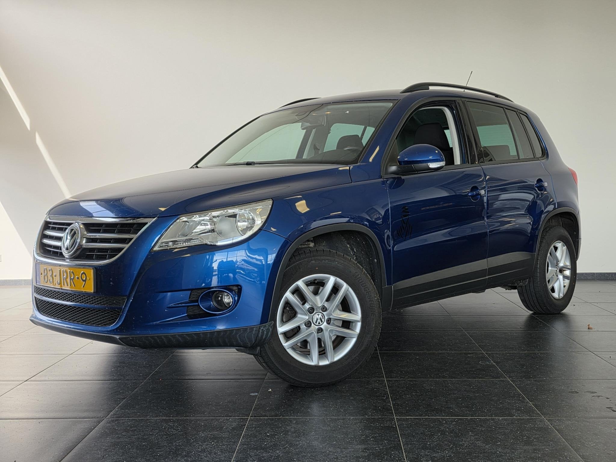 Volkswagen Tiguan 1.4 TSI Comfort&Design | Zo Meenemen | NL-, Auto's, Voorwielaandrijving, Stof, Zwart, 4 cilinders