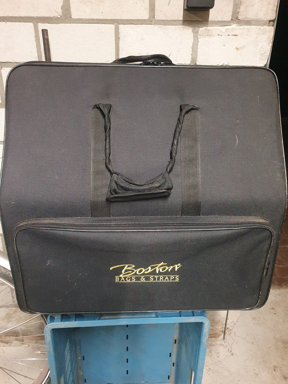 koffer voor accordeon, Ophalen