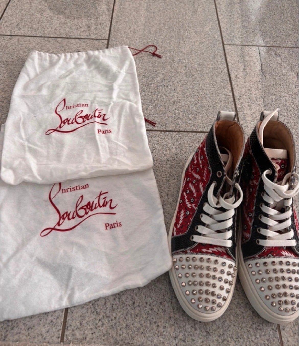 Christian Louboutin sneakers - Zeer goede staat - Maat 40, Ophalen of Verzenden, Zo goed als nieuw, Rood, Sneakers of Gympen